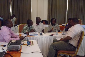 Ugandan Scientists and Journalists Strive to Find a Middle Ground